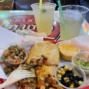 Chicken Fajita Chimi. Two margaritas on the rock on the side. I'm new to Texas and it is my favorite "after work" spot.