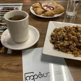 Laphet thoke with samosas in the background