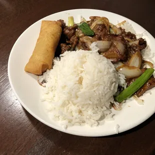 Lunch Special - Mongolian beef, white steamed rice and fried egg roll.