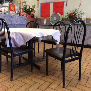 a table and chairs in a restaurant