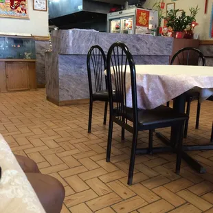 a table and chairs in a restaurant