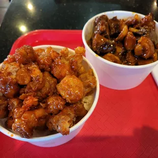 two bowls of food on a red tray