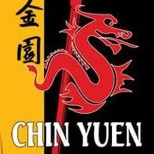 a red dragon on a yellow and black background