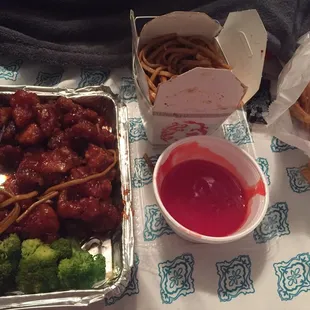 General Tso's Chicken* with lo mein and wontons! So delicious!