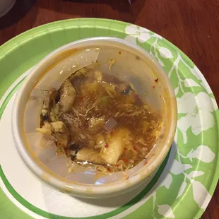 a bowl of soup on a plate