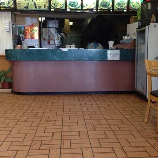a view of a restaurant counter