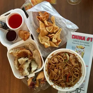 Pan-fried dumplings, egg roll, crab rangoon, and chicken lo mein.