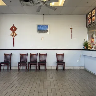 a row of chairs in a restaurant