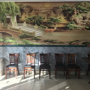 a mural of a deer in a restaurant