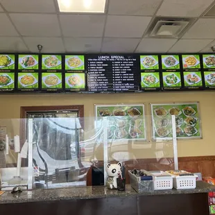 menus on the wall of a restaurant