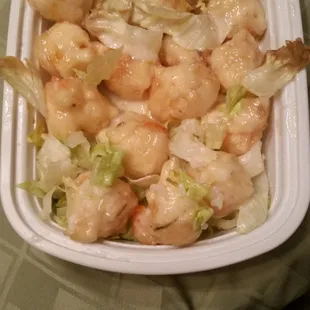 Gross! Brown lettuce and dirty shrimp. It cost $11 which is a joke. I'm going to toss this mess and make myself a sandwich.