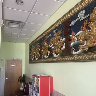 a picture of a chinese mural on the wall