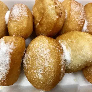 (Fried Biscuit) ten per order of lightly coated crispy donuts with/ without sugar