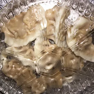 Order of steamed dumplings also came with dipping sauce, were delicious