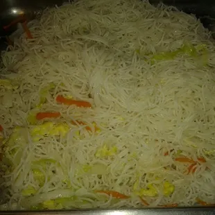 a mixture of noodles and vegetables