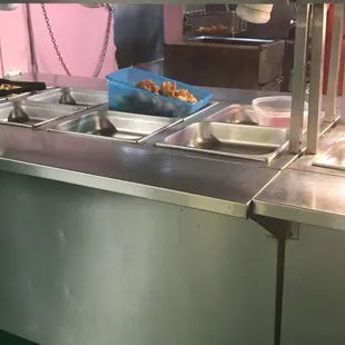 Pre fried sweet and sour chicken in Tupperware container without heat lamp. Anyone want food poisoning?