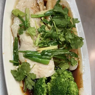 Steamed fish with ginger soy sauce $ 15  Can feed 2-3 person  Must try ! Better you call first cause need 20 min for cook.