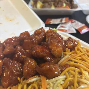 Orange chicken and chow mein and wonton soup Beef teriyaki bowl