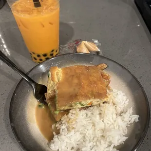 Egg Foo Young with the gravy on it.