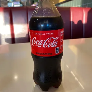 Drinking coke while waiting for my food