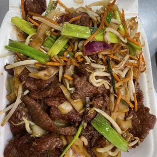 beef and noodles in a styrofoam container