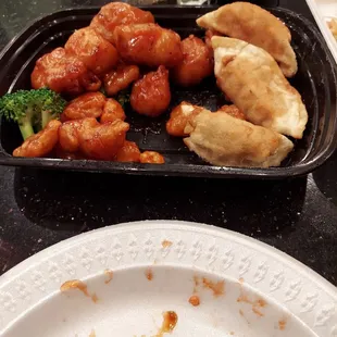 Orange chicken and 3 pot stickers.