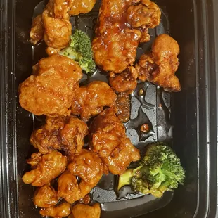 chicken and broccoli in a plastic container