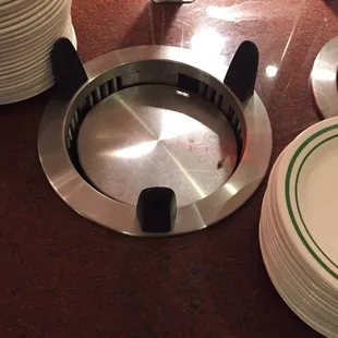 This place had a roach on the plate holder next to the food!!!