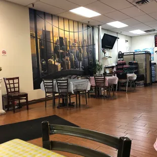 a restaurant with tables and chairs