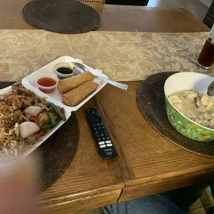 orange chicken, chow mein, fried rice, chicken veggie dish 2 chicken egg rolls, big bowl whar wonton soup. $23.00 for everything!