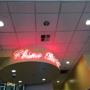 a neon sign in a restaurant