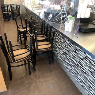 Chair barrier between ordering area and staff
