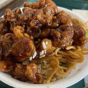 Orange Chicken (Mild Spicy) bowl with rice and chow mein