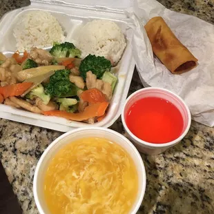Chicken with broccoli lunch special with a side spring roll and egg drop soup