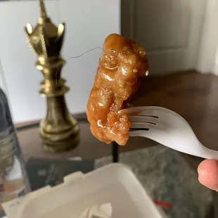 Sesame chicken with hair.