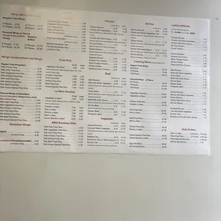 Updated menu on wall of restaurant as of 9/1/2021