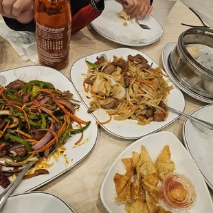 Mongolian beef and beef Chow Fun with Xiao long bao pork