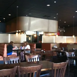 a woman sitting at a table