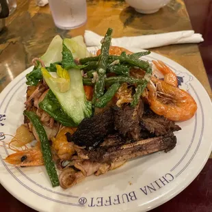 Short ribs, crispy shrimps, veggies and octopus