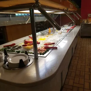 a buffet with a variety of food items