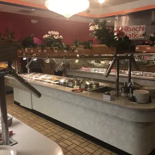 a buffet with a variety of food items