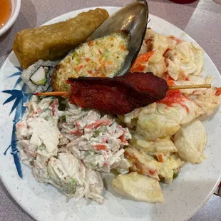 a plate of food and a cup of tea