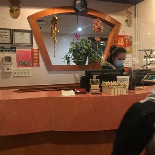 a woman sitting at a counter