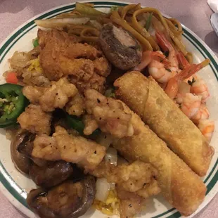 His plate. He gets his money's worth.