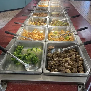 a variety of food items in a buffet