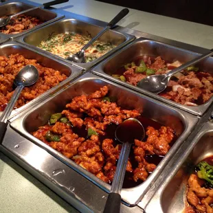 a variety of dishes of food