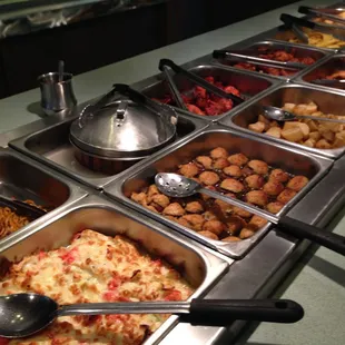 a variety of dishes of food