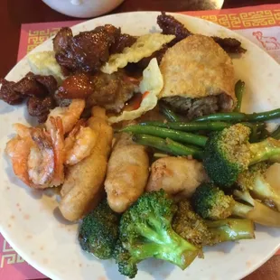 a plate of chinese food on a table