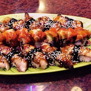 Daniel and Tony do a wonderful job.  Custom rolls galore, I love these guys.  10 pieces of Unagi and customer Dragon Roll......  Heaven!!!!