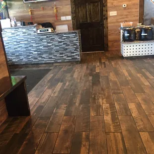 the wood flooring in the restaurant
